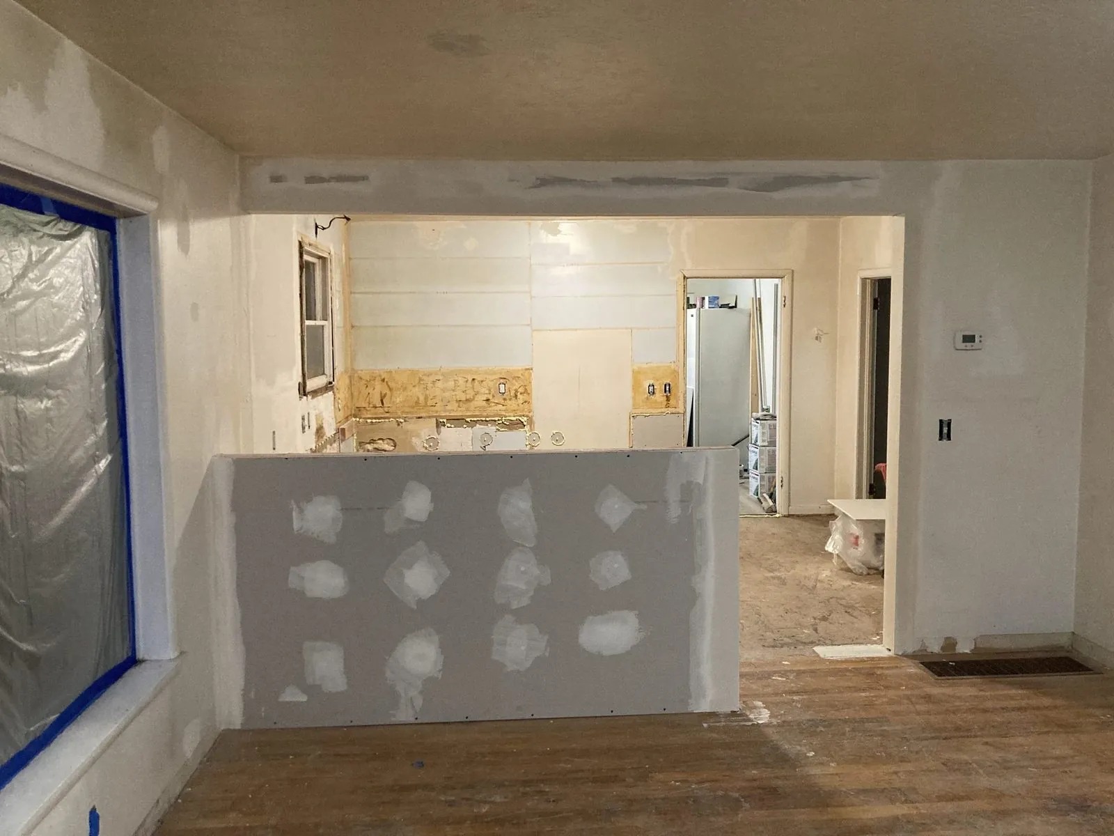 Drywall and framing phase — open floor plan remodel